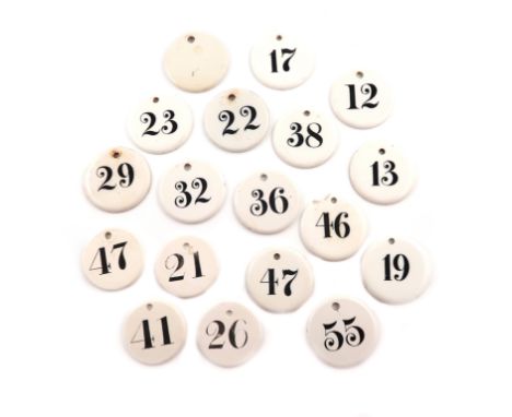 A collection of eighteen ceramic bin labels, some by Wedgwood, Charles Farrow, and  Farrow and Jackson, London, circular form