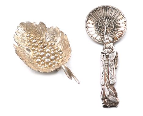 A Japanese silver caddy spoon, modelled as a Geisha girl holding a parasol, length 8cm, plus a leaf caddy spoon, by Joseph Wi