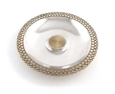 By Stuart Devlin, a modern parcel-gilt silver rose water dish, London 1982, circular form, with a pierced textured out border