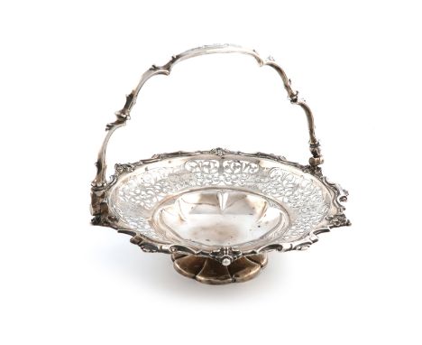A Victorian silver swing-handled basket, by Henry Wilkinson and Co., Sheffield 1855, circular form, pierced and engraved foli