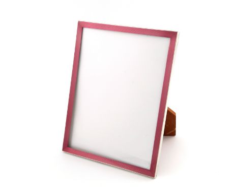 A silver and pink enamel photograph frame, by Sanders &amp; Mackenzie, Birmingham 1979, upright rectangular form, the enamel 