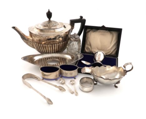 A mixed lot of silver items, various dates and makers, comprising: a presentation teapot, by William Hutton and Sons, Sheffie