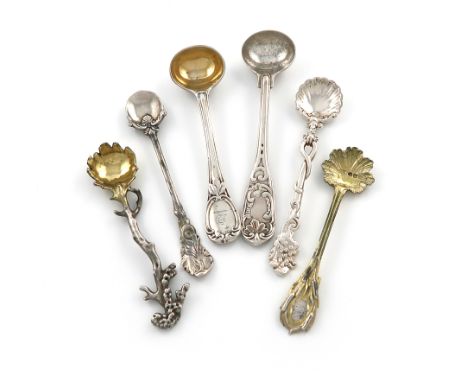 A small collection of six antique silver salt spoons, comprising: a William IV one by Paul Storr, London 1833, foliate and sc