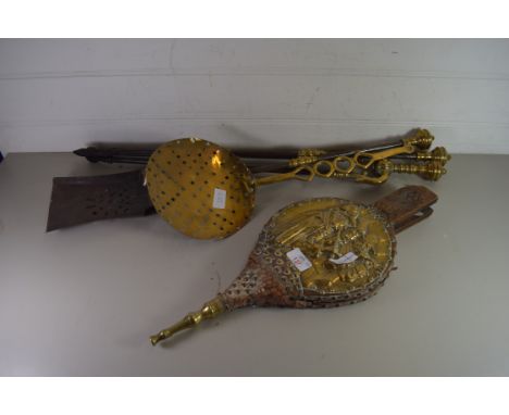 SET OF THREE BRASS AND STEEL FIRE TOOLS, TOGETHER WITH A BRASS CREAM SKIMMER