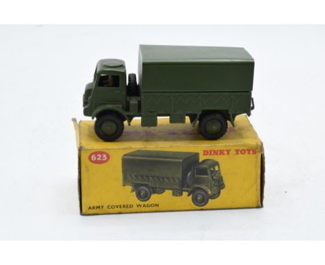 Boxed Dinky Toys Army Covered Wagon 623. In good condition with some evidence of use and play-wear such as small paint chips,