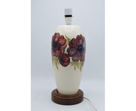Moorcroft Hibiscus on magnolia large lamp base. 33cm tall excluding light fitting. In good condition with no obvious damage o
