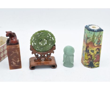 A collection of oriental items to include Jade and similar items to include figures, snuff bottle etc 