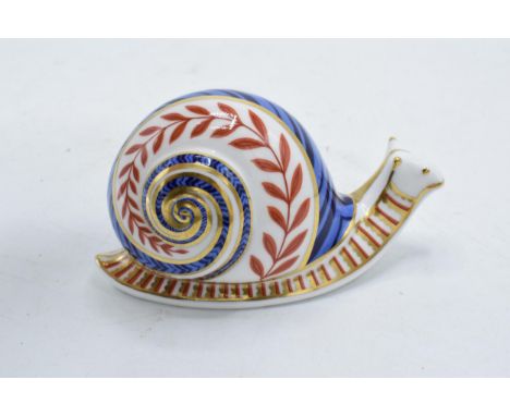 Royal Crown Derby paperweight in the form of a snail. First quality with ceramic stopper. In good condition with no obvious d