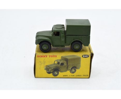 Boxed Dinky Toys Army 1-Ton Cargo Truck 641. In good condition with some evidence of use and play-wear such as small paint ch