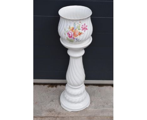Pottery jardinière on ceramic white stand 78cm tall. In good condition. 