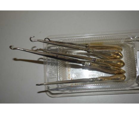 Group of silver handled button hooks