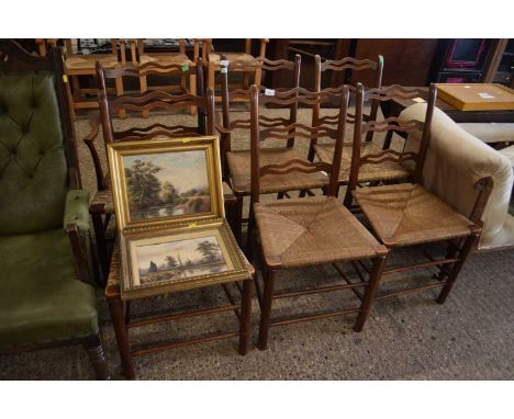 A set of six ash framed ladder back and rush seated dining chairs