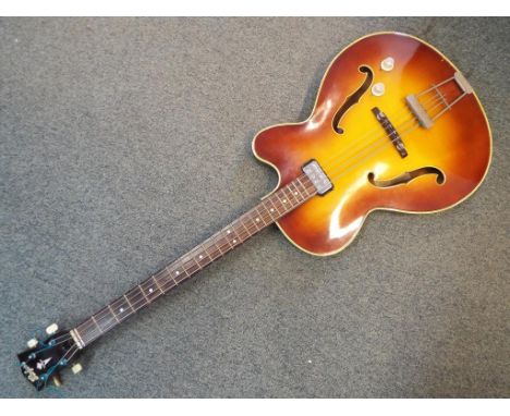 A vintage Hofner Senator bass guitar, sunburst finish, numbered 1375, Hofner paper label inside body, pickguard present but n