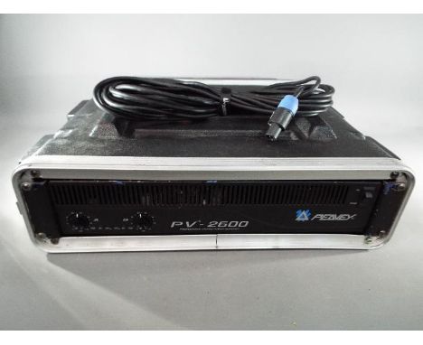 Peavey - A Peavey PV 2600 professional stereo power amplifier contained in hard case.