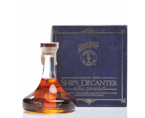 WHITE HORSE AMERICA'S CUP DECANTER 
Blended Scotch Whisky in Hand-made Royal Doulton Crystal decanter. Distilled and bottled 