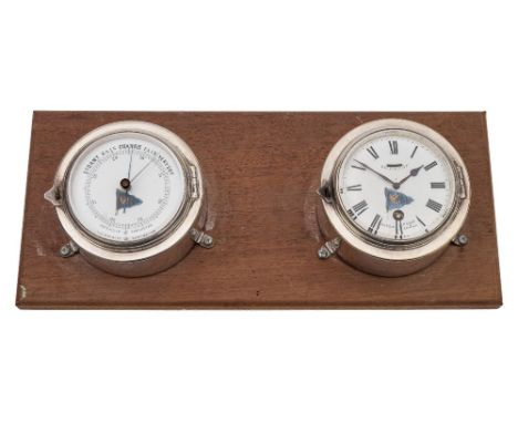 A late Victorian silver plated bulkhead clock by S Benzie, Cowes and matching  bulkhead barometer:, the clock with single bar