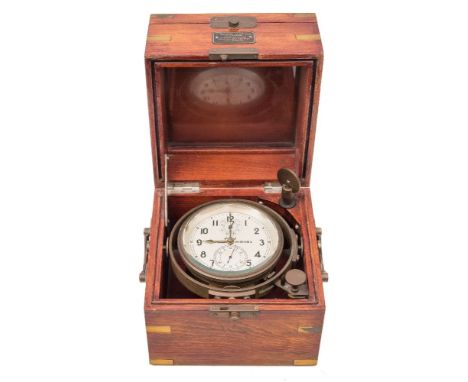 A Russian two day marine chronometer:, the silvered dial with arabic numerals, subsidiary seconds and wind down dials, signed