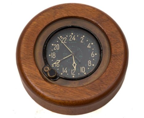 A BU Aero US Navy 8 day cockpit clock by Waltham:, with 24 hour dial and date dials with Arabic numerals, signed as per title