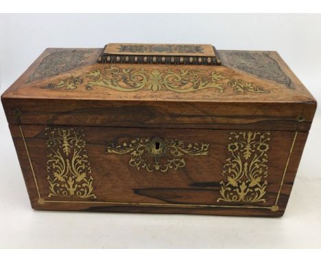 A 19th cent tea caddy together with other wooden ware and boxes . (4)