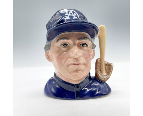 Bone china character jug of a Los Angeles Dodgers player. White baseball, light brown baseball glove, and baseball bat formed