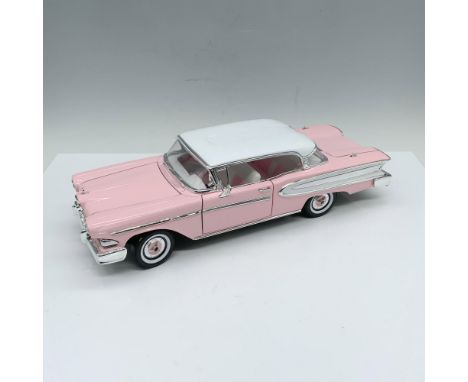 Gorgeous depiction of a baby pink car with white and pink interiors and whitewall tires. Driver and passenger doors open as w