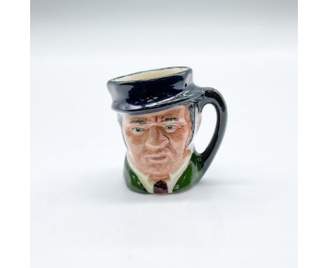 Green coat, brown tie, dark navy blue hat and plain black handle. Part of the Charles Dickens Commemorative Tiny Set, celebra