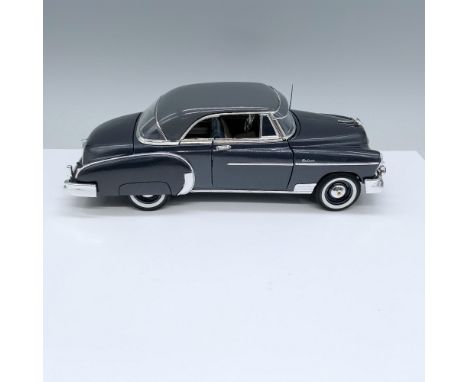 Body is painted dark gray and hard top is a lighter gray, hood, trunk and doors open. Not Marked. Issued: 20th centuryDimensi