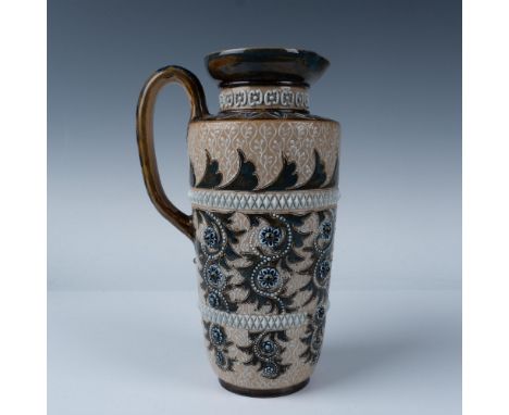 Stunning salt glazed pitcher with white beaded reliefs and rosettes. Brown, ivory, and blue coloration. Doulton Lambeth backs