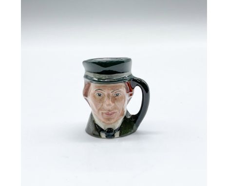 Moss-green coat, black tie and plain black handle. Part of the Charles Dickens Commemorative Tiny Set, celebrating the 170th 