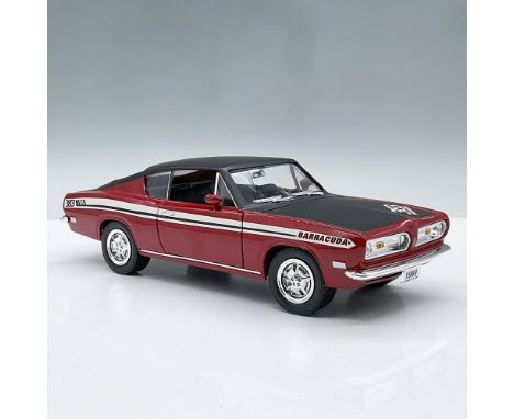 Red and black model car featuring a black interior and movable parts including the two doors, the hood, the front seats and s