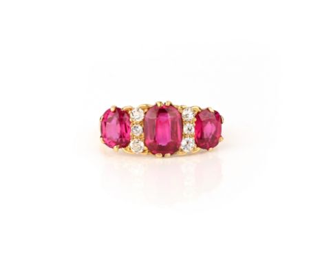 A synthetic ruby and diamond ring, early 20th century, set with three cushion-shaped synthetic rubies, spaced by cushion-shap