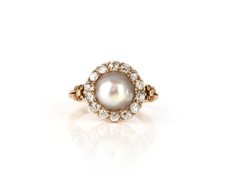 A Victorian pearl and diamond cluster ring, the half pearl set within a surround of old cushion-shaped diamonds within scroll