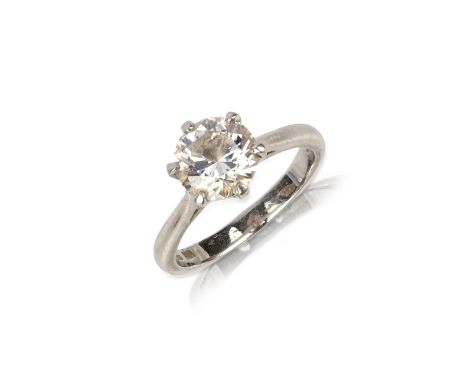 A diamond solitaire engagement ring, claw-set with a brilliant-cut diamond weighing approximately 1.80 carats, mounted in pla