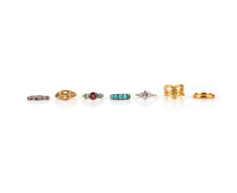 A group of 7 rings, including a diamond two-stone ring, set in platinum and gold, size P, a turquoise five stone gold ring, s