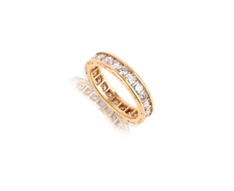 Cartier, a diamond eternity ring, of full eternity design, set with brilliant-cut diamonds, mounted in yellow gold, size K, s