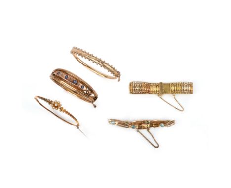 Five gold bracelets, comprising: a hinged gold bangle set with half seed pearls; a hinged 9ct bangle set with circular-cut sa