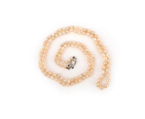 A natural pearl necklace, composed of a single row of natural pearls measuring approximately 3.6-5.1mm, to a silver clasp set