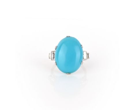 A turquoise and diamond ring, set with a cabochon turquoise, to shoulders set with baguette diamonds, size J, stamped PLAT, F