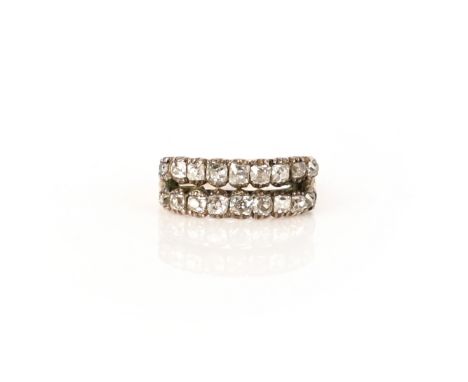 A diamond half hoop ring, early 19th century, composed of two rows of cushion-shaped diamonds in closed-back settings, to a f