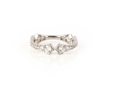 A diamond eternity ring, of waisted design set with graduated round brilliant-cut diamonds in platinum, size K