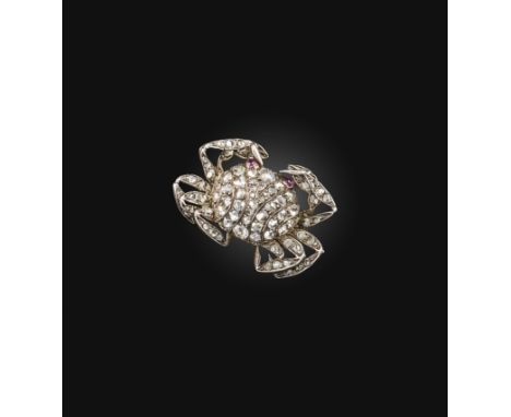 A late 19th century diamond crab brooch, realistically formed and pave-set with graduated rose-cut diamonds and ruby cabochon
