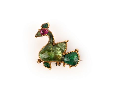 An emerald, ruby and foiled gemstone brooch, India, 19th century, designed as a bird, set with carved emeralds and foil-backe