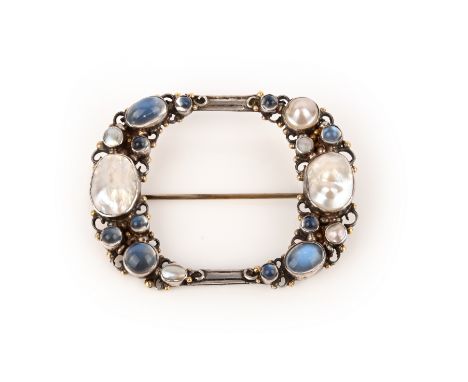 Attributed to Dorrie Nossiter, an Arts &amp; Crafts moonstone and mother of pearl brooch, circa 1930, of oval outline, constr