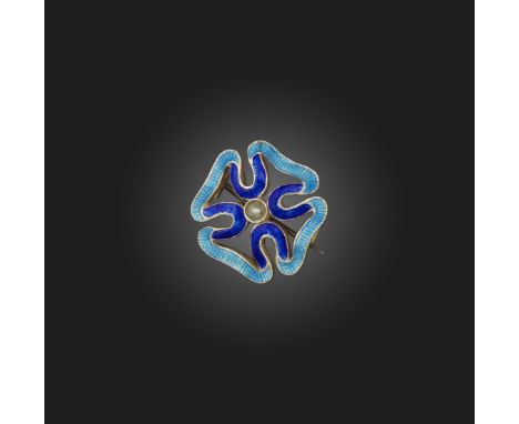 Child &amp; Child, a silver, enamel and seed pearl brooch, circa 1900, designed as a ribbon scroll in the form of a Maltese c