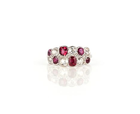 A ruby and diamond half hoop ring, of chequerboard design set with rubies and diamonds in platinum, size N