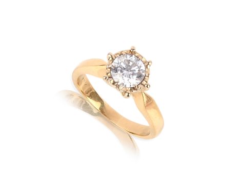 A diamond solitaire ring, the round brilliant-cut diamond set in yellow gold, stamped .99 and 18k to interior, size N