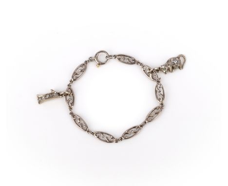 A platinum and diamond charm bracelet, early 20th century, the links of oval scroll design, suspending two charms of a mouse 