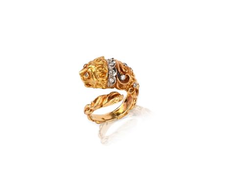 Zolotas, a gold and diamond ring, the coiled ring with scrolled decoration culminating in a lion's head, accented with single