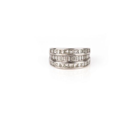 A three row diamond half eternity ring, set with princess-cut and baguette-shaped diamonds in 18ct white gold weighing an app