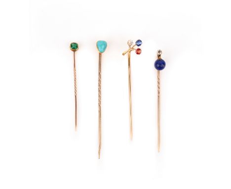 A collection of four gold and gem-set stick pins, late 19th century, comprising: one stick pin set with a step-cut emerald; o